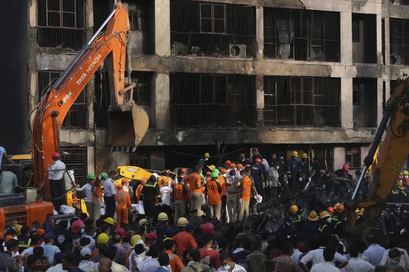 ###### Rescue teams work at the site of a plane crash in Ahmedabad, India, on Thursday, June 12, 2025